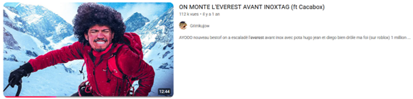 Capture d'écran d'une vidéo YouTube de Grimkujow intitulée « ON MONTE L'EVEREST AVANT INOXTAG ». La miniature montre le créateur de contenu avec une expression de fatigue intense en tenue d'alpiniste et en pleine ascension d'un sommet enneigé.
