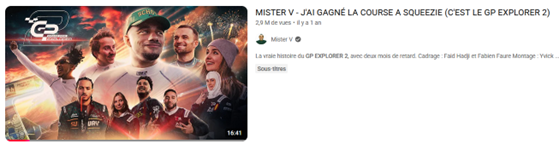 Capture d'écran d'une vidéo YouTube de Mister V intitulée « MISTER V - J'AI GAGNÉ LA COURSE A SQUEEZIE (C'EST LE GP EXPLORER 2) ». La miniature, au style d'affiche de film épique, montre plusieurs pilotes de la course (youteubeurs et streameurs) entourant Mister V au centre, avec des feux d'artifice et le logo du GP Explorer en arrière-plan.